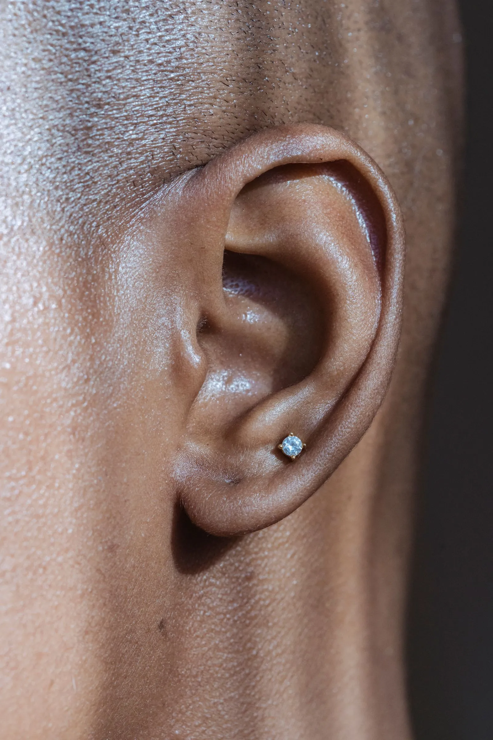 Solitaire Glow Studs — styled