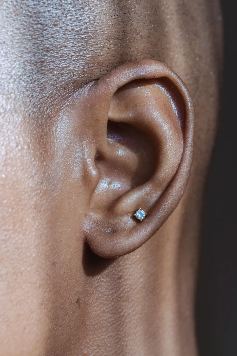 Solitaire Glow Studs — styled
